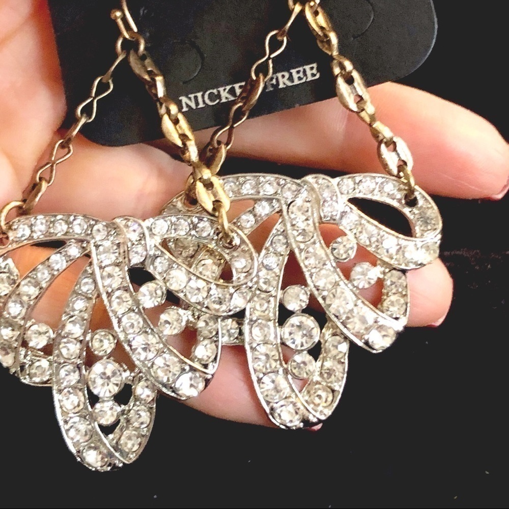 FABULOUS CRYSTAL BOW STATEMENT EARRING #270